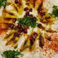 Baba Ganoush & Pita Bread · Vegetarian. Mashed and grilled eggplant, mixed with tahini sauce, yogurt, garlic, pomegranat...
