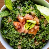 Tabouli Salad · Vegetarian. Parsley, tomato, onion, bulgur, tossed in lemon juice and olive oil dressing..