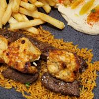 Mixed Grill Platter · Grilled marinated chicken pieces, grilled marinated pieces of lean beef, one skewer of spice...