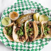 Steak Tacos (5 Pcs) · Tacos, steak, grill onions, and cilantro.