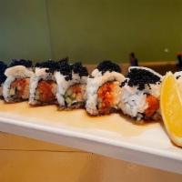 Black Pearl Roll · Spicy Tuna, Crabmeat, Cucumber Topped with White Tuna and Black Tobiko (Ponzu Sauce on the s...