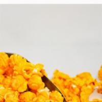 Real Cheese Popcorn · Our delicious popcorn coated in real Cheddar cheese.