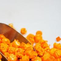 Orange · An orange-flavored candy-coated popcorn.