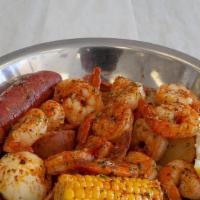 The Key Shrimp · 10 shrimps, sausage, corn, egg, and potatoes.
