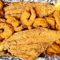 Fried Fish And Shrimp · 2 pc fried catfish, 8 fried shrimp hush puppies, and fries