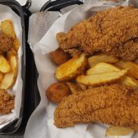 2 Pc Fried Fish · 2 pc fried catfish, hush puppies, and fries