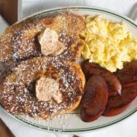 French Toast · Two eggs, grilled sausage, and two slices of French toast.