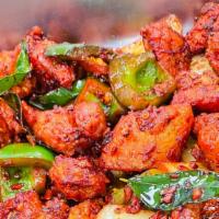 Chicken 65 · Diced bell pepper, onion and herbs, curry leaves.