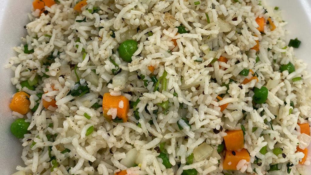 Mumbai Chili Fried Rice · Basmati rice, carrot, green peas, scallion, cilantro, black pepper.