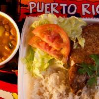 Chuleta Frita, Arroz, Habichuelas Plate · Pork chop with rice, beans and salad.