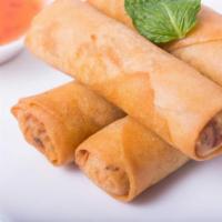 Egg Rolls · Fried vegetable rolls, cabbage, carrot, onion, house made sweet & sour sauce. 4 rolls.