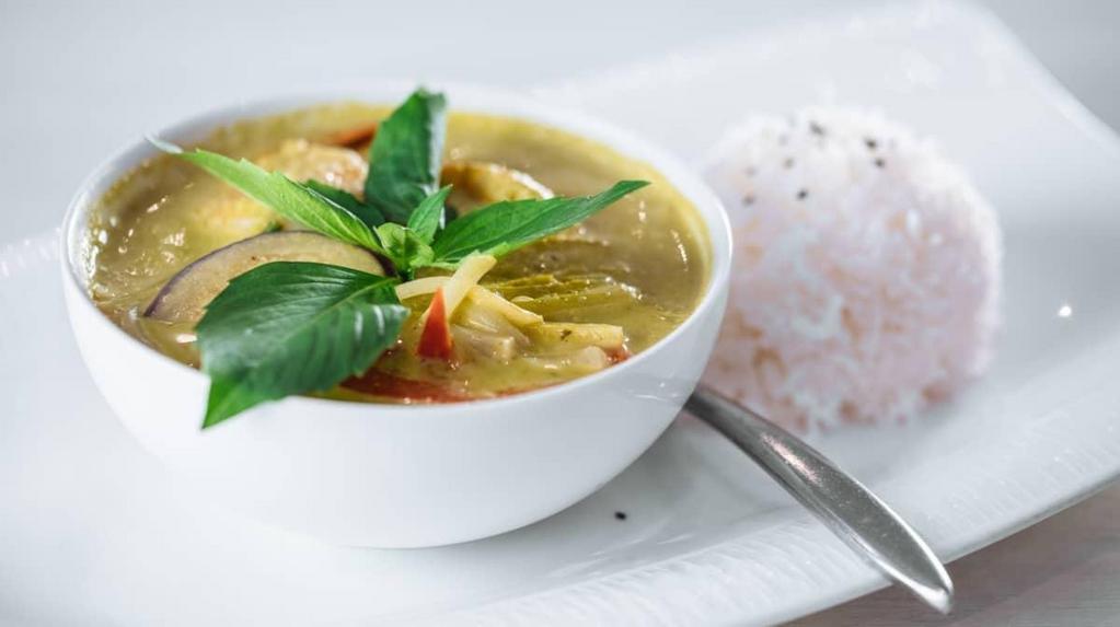 Green Curry · Spicy. Spicy green curry, coconut milk, Japanese purple eggplant, bamboo shoot, Thai basil, red bell pepper. Served with jasmine white rice.