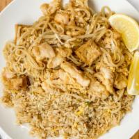 Pad Thai · Rice noodles, chicken, shrimp, bean sprout, tofu sautéed in chef's special sauce, topped wit...