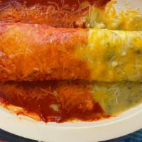 El Mananero · Burrito with potato, eggs, choice of ham, bacon or sausage. Smothered with both red & green ...