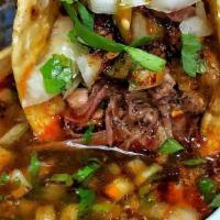 Consome Con Birria (Grande)(Large) · Lamb soup with meat . Large 32oz