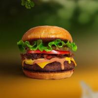 Primetime Classic Burger · Seasoned Beyond meat patty topped with lettuce, tomato, onion, and pickles. Served on a bun.