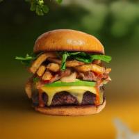 Freedom Fries Burger · Seasoned Beyond meat patty topped with fries, avocado, melted vegan cheese, onion, lettuce, ...