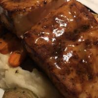 Wood Fired Plank Salmon · Garlic mashed potatoes, brussel sprouts orange dijon glaze.