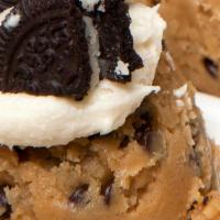 Cookies & Cream · Topped with a dollop of cream cheese frosting and 