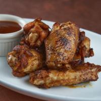Jumbo Smoked Chicken Wings · Grilled chili-rubbed jumbo wings and drummies.