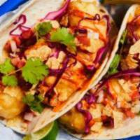 Beer Batter Tacos · Swai angry orchard battered fish tacos with diced tomatoes, avocado, shredded cabbage with h...