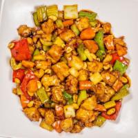 Kung Pao · Spicy. Stir-fried with bell pepper, carrots, celery & peanuts.