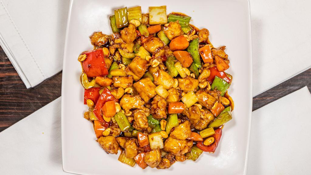 Kung Pao · Spicy. Stir-fried with bell pepper, carrots, celery & peanuts.