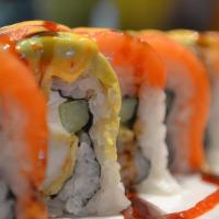 Howdy Roll · Spicy tuna, spicy salmon, crab meat and avocado topped with wasabi tobiko and wasabi sauoe.