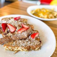 Strawberry Banana Oatmeal Paris Texas Platter (V) · Combine our classic savory Migas with our sweet homemade strawberry banana French toast. Cho...