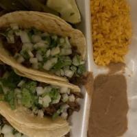 Taco Special · 3 Corn tacos any meat choice, rice, beans, and 16 oz soda.