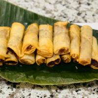 Lumpiang Shanghai App (Pork) · 6pc Fingerling egg roll with ground pork, carrots, celery, cabbage, green onion and mama's m...
