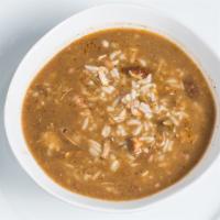 Gumbo · With small scoop of rice and cracker.