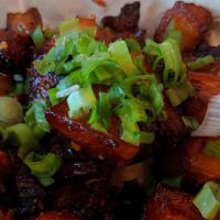 Pork Belly Bites · slow roasted 5 spice pork belly bites tossed in our signature hot honey garlic sauce and top...