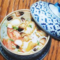 Lemon Grass Noodle · Seafood soup (shrimp, crab meat, mussel shell, fish ball, scallop and squid) with lemon gras...