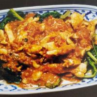 Pad Pra Ram · Chicken, spinach, and peanut sauce.
