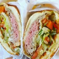 Prime Rib & Provolone Cheese · Served with ALL TOPPINGS: . Mayo, Mustard, Hot Peppers, Onion, Lettuce, Tomato, Pickle, Seas...