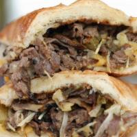 Snarf'S Cheesesteak · Roast Beef, American & Provolone Cheese, w/ Grilled Mushrooms, Onions & Hot Peppers