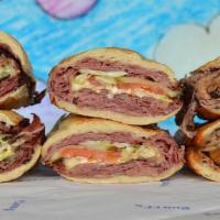 Big Fat Snarf · DOUBLE the meat! Your choice of all Corned Beef, all Pastrami, or half & half, w/ Swiss Chee...