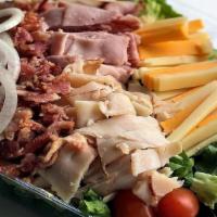 Snarf Salad · Turkey, Ham, American & Swiss Cheese, w/ Grape Tomatoes, Hard-Boiled Egg, Onion and Bacon Bi...