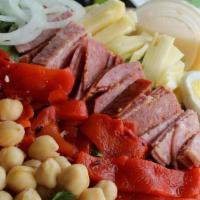 Italian Salad · Pepperoni, Salami, Provolone & Swiss Cheese, w/ Onion, Garbanzo Beans, Roasted Red Pepper, G...