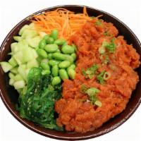 Spicy Tuna Bowl · Spicy tuna, cucumber, seaweed salad, edamame, carrots, green onion, cilantro, jalapeno, temp...