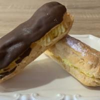 Puff Eclair - Sugar Powder · Soft dough pastry filled with old fashioned cream and finished off with a Sugar Powder