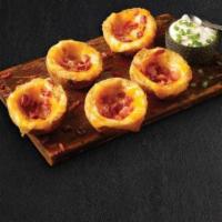 Loaded Potato Skins · 8 Crispy white potatoes topped with a layer of metlted cheddar and crispy bacon Served with ...