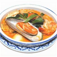 Sf 5. Hoo Mok Talay · Seafood with red curry, bell pepper, Napa, markroot and basil.