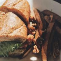 Fried Catfish Po Boy
 · Fried catfish on a whole-wheat hoagie with lettuce, tomatoes, pickles, onions, and tartar sa...