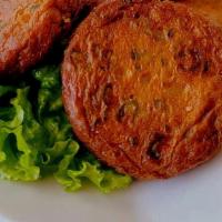 Thai Fish Cake (5 Pieces) · Fresh fish paste,red curry paste and kaffir lime leaves served with cucumber sauce​