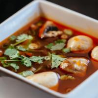 Tom Yum Soup · Thai style spicy & sour soup with mushroom, infused with kaffir lime leaves, galanga & lemon...