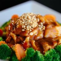 Pad Peanut (Pra Ram) · Choice of meat, sautéed coconut milk & topped with spicy peanut sauce. Served on a bed of st...