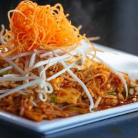 Pad Thai · Thin rice noodles cooked with bean sprouts, green onions & egg with tamarind sauce & topped ...