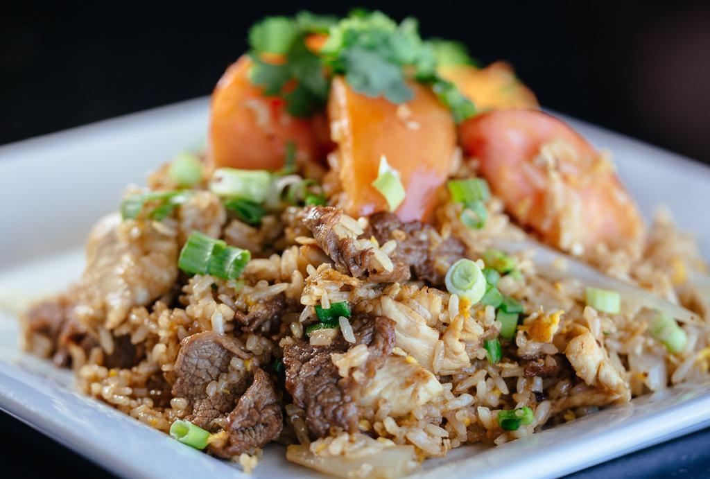 Bangkok Fried Rice · Combination (chicken & beef) Thai style fried rice with eggs & onions.